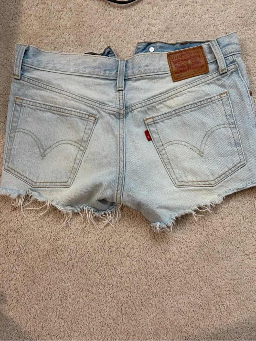 Levi's Light Blue Frayed Denim Cutoff Shorts - Picture 3 of 3